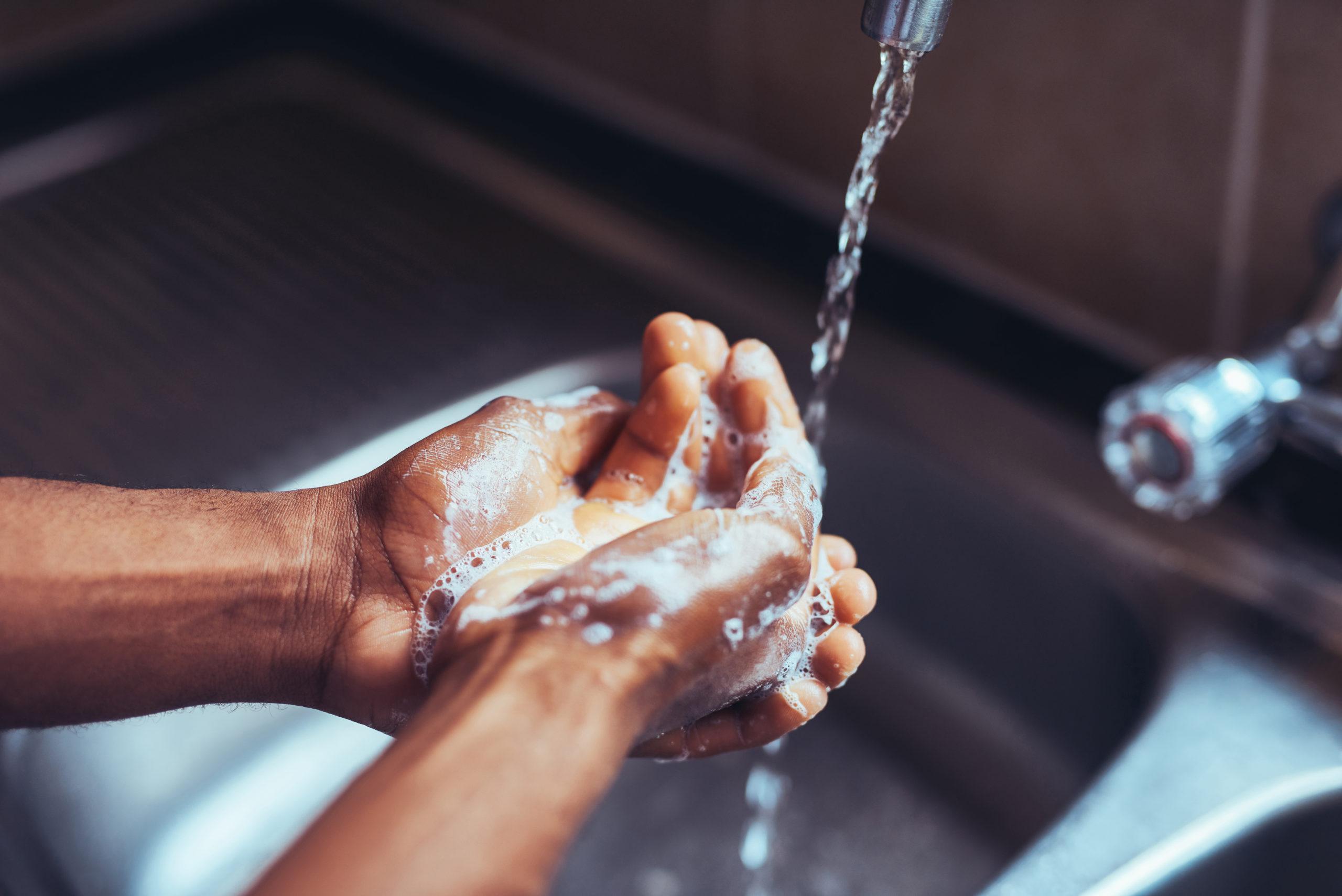 person-washing-hands