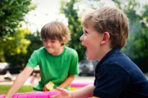 Young boys smiling in the park