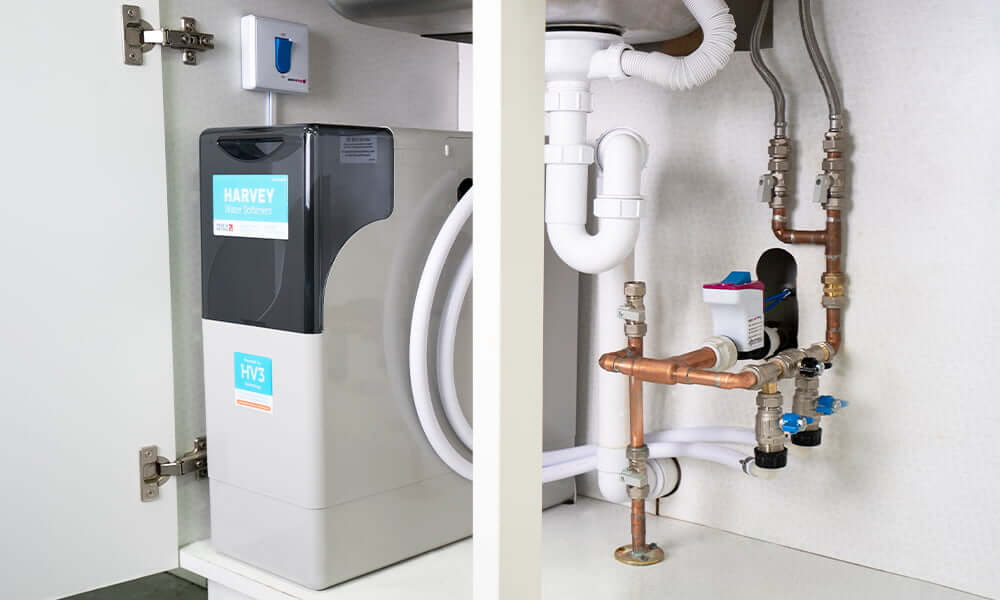 Harvey water softener installed under the sink.