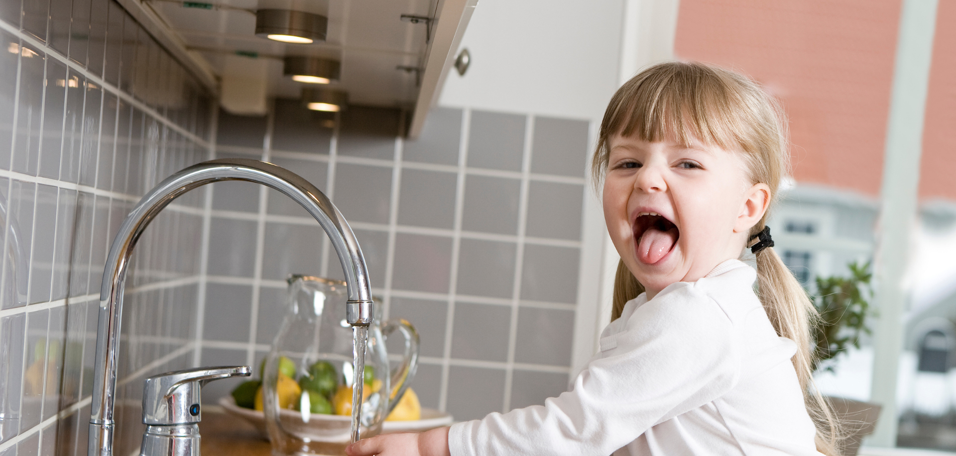 girl-drinking-from-tap